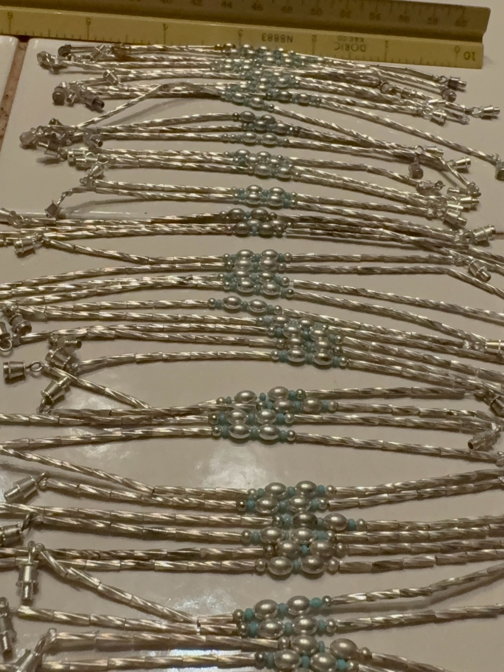 45 Silver Multi-Strand Bracelets with turquoise Bead Clusters
